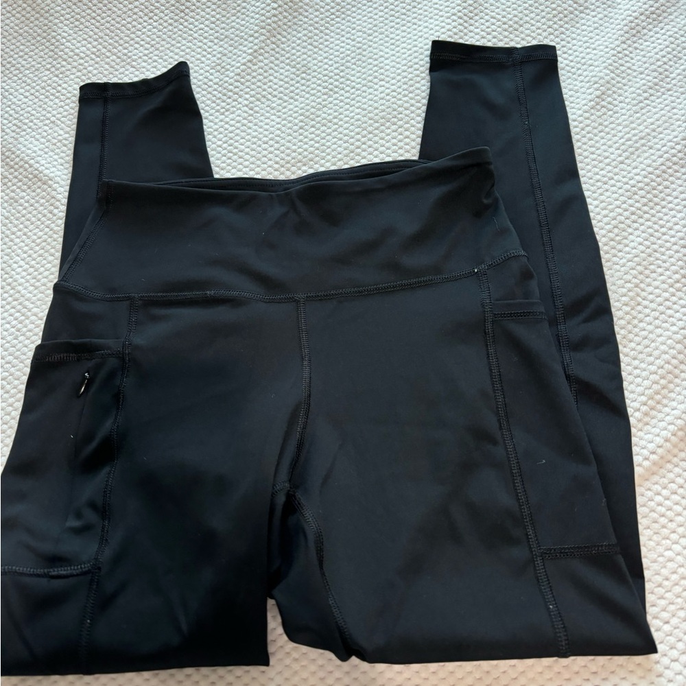 Black high-waisted leggings with pockets